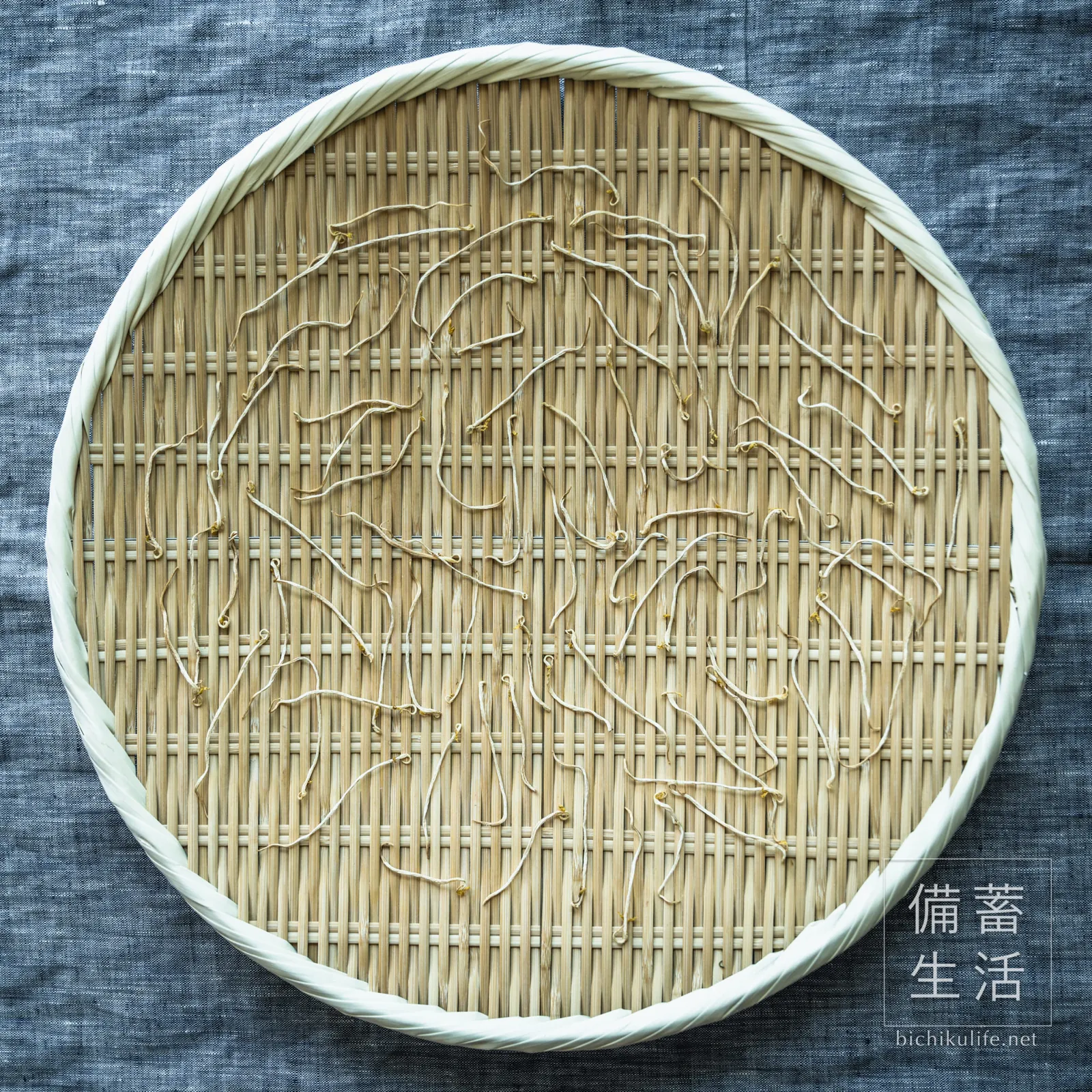 Dried bean sprouts on a bamboo basket