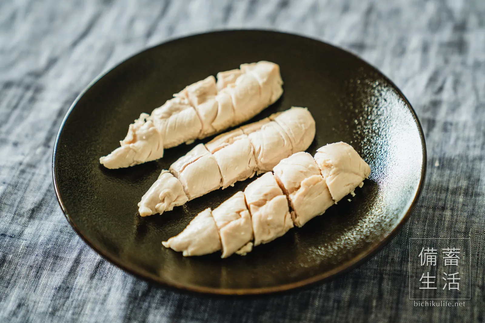 Sliced nuka-pickled chicken tenderloin on a plate