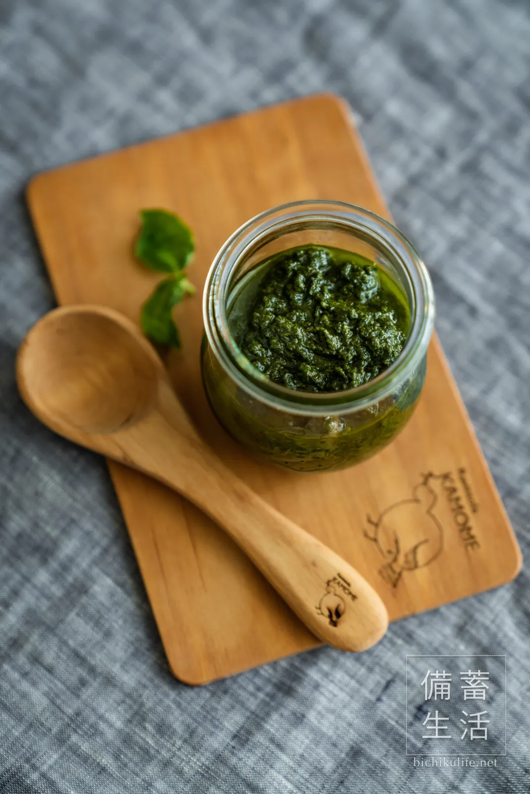Homemade basil paste in a jar