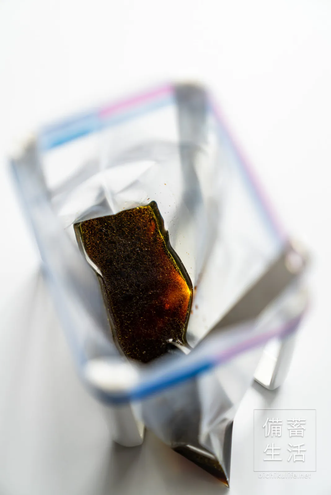 Adding figs to the marinade in a zip-top bag