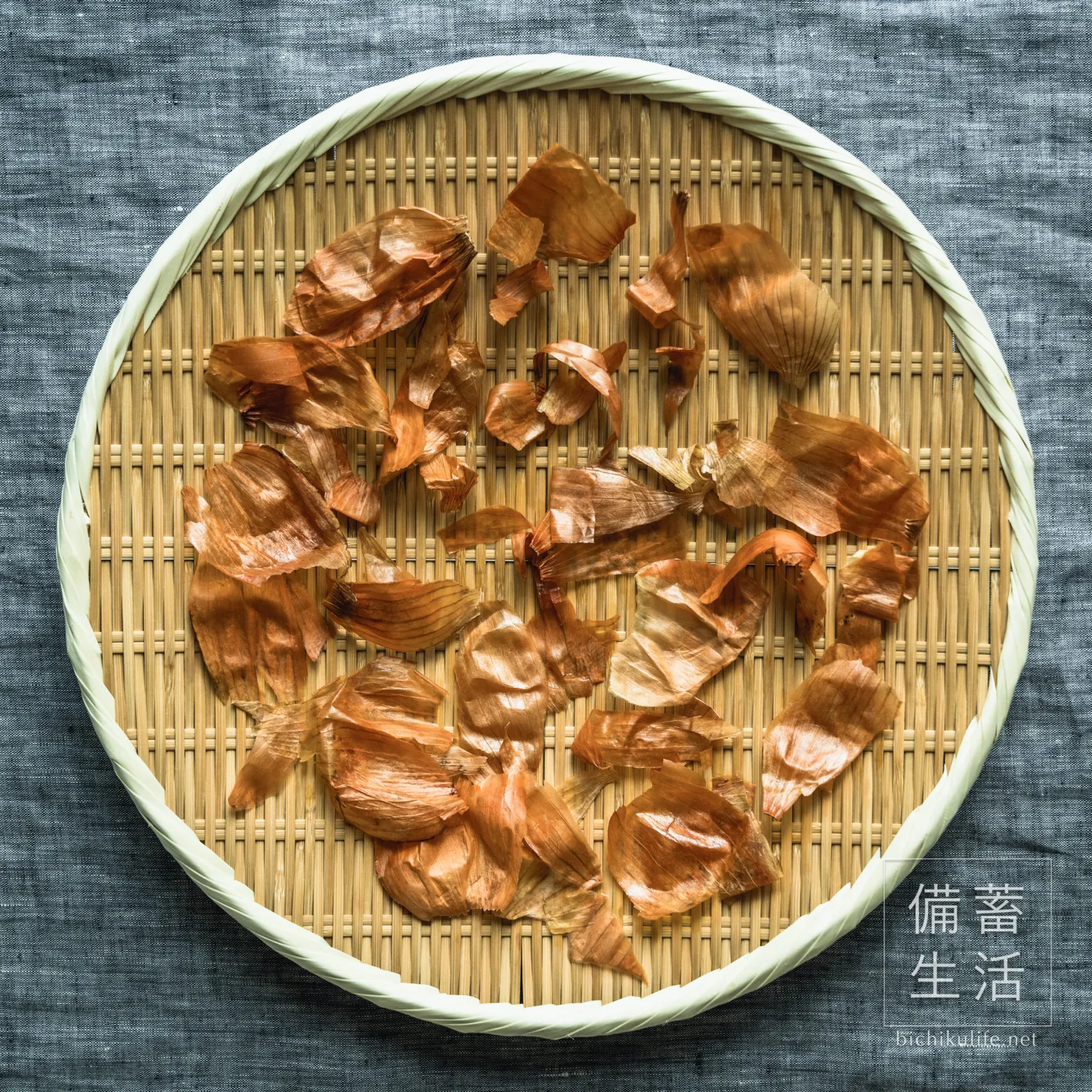 Washed onion skins draining in a colander